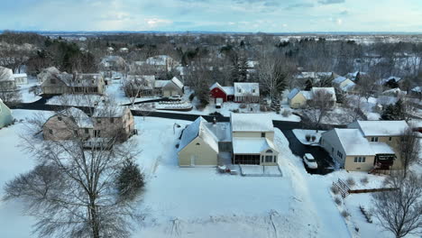 Red-Cape-Cod-home-in-residential-housing-community