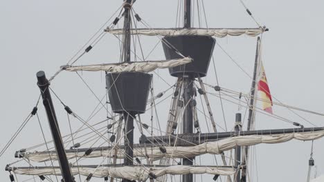 ferdinand magellan nao victoria carrack boat replica spanish flag masts and sails detail shot in slow motion 60fps