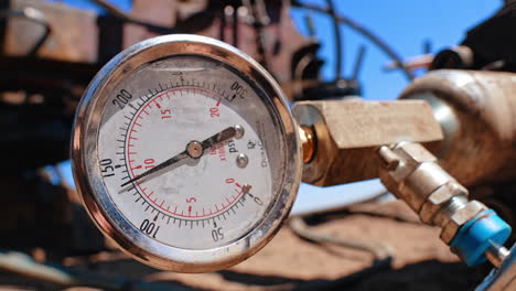 manometer dial placed horizontally. close up. detail from the equipment used for drilling oil and gas.
