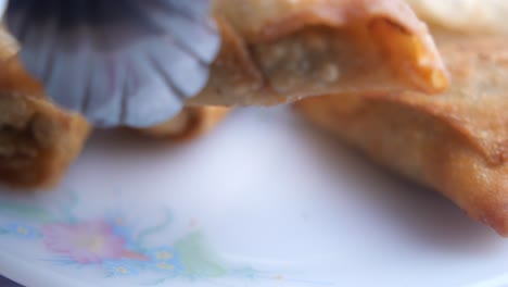 closeup of crispy fried samosas