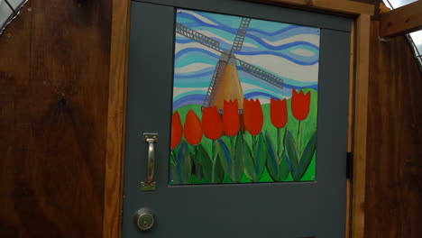 tulips artwork on a homeless hut