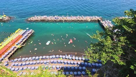 aerial view of beachgoers in sorrento, italy