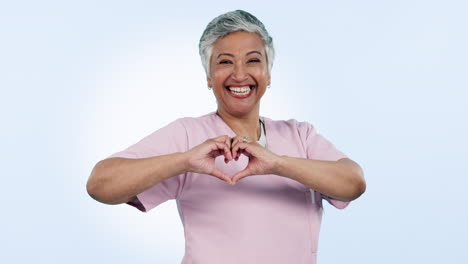 Happy-woman,-face-or-senior-nurse-with-heart-hands