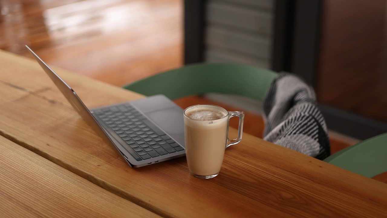 Cozy Home Office Setup with Coffee