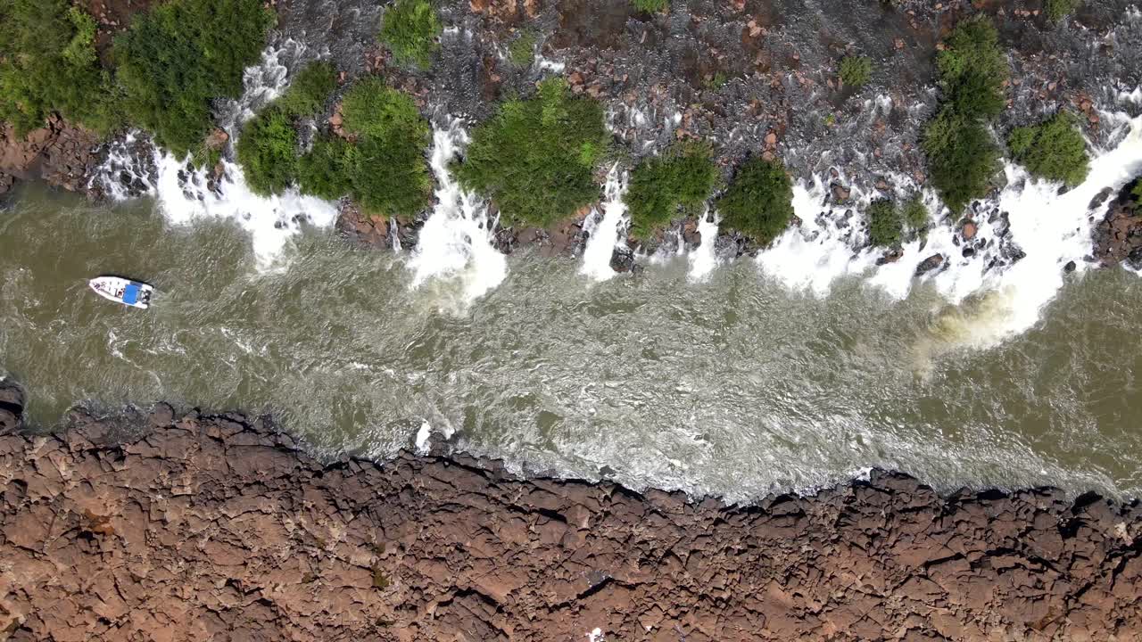 Top View over the Mocon&aacute; Waterfalls, Boat Following the Direction of the River