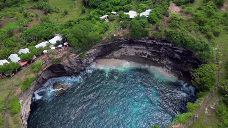 water crashes inside cut out at broken beach nusa penida indonesia