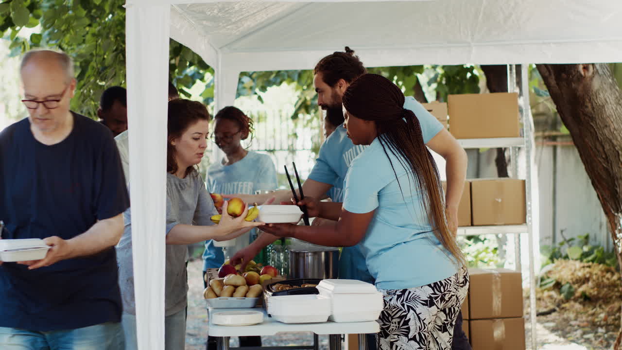 Individuals Volunteering At A Food Drive
