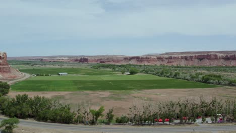 green agricultural farmland in southwest utah desert during drought, aerial