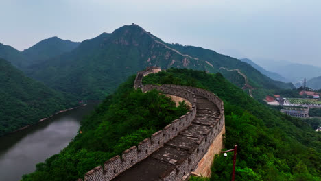 aerial view following the huanghuacheng great wall, cloudy, summer day in china