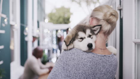 city, love and woman carrying dog in arms enjoying