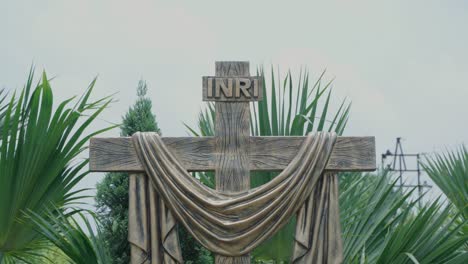 a statue of the crucifixion of jesus. it is located inside bandel church in west bengal