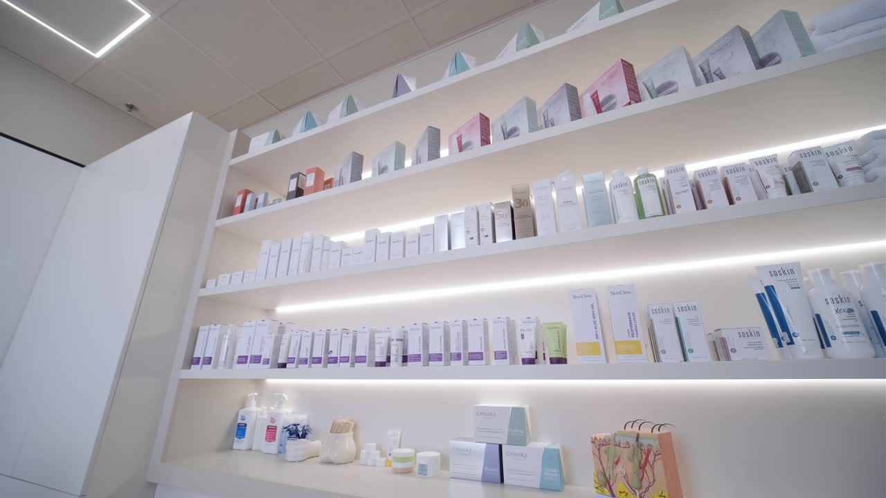 KIYV, UKRAINE - JUNE 2023: Bottles of various shades concealer on display in the cosmetics section of a store