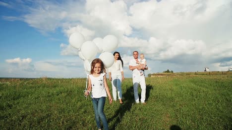 happy family with balloons