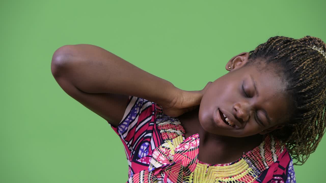 Young African woman having neck pain