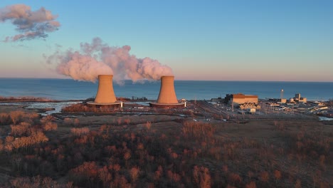 sunset aerial view of enrico fermi ii nuclear power plant on lake erie, berlin township, michigan, usa