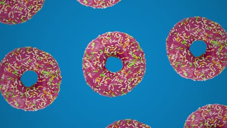 patrón geométrico con rosquillas de caramelo rosas en un fondo azul. concepto de comida gráfico de movimiento bucle sin costuras animación mínima
