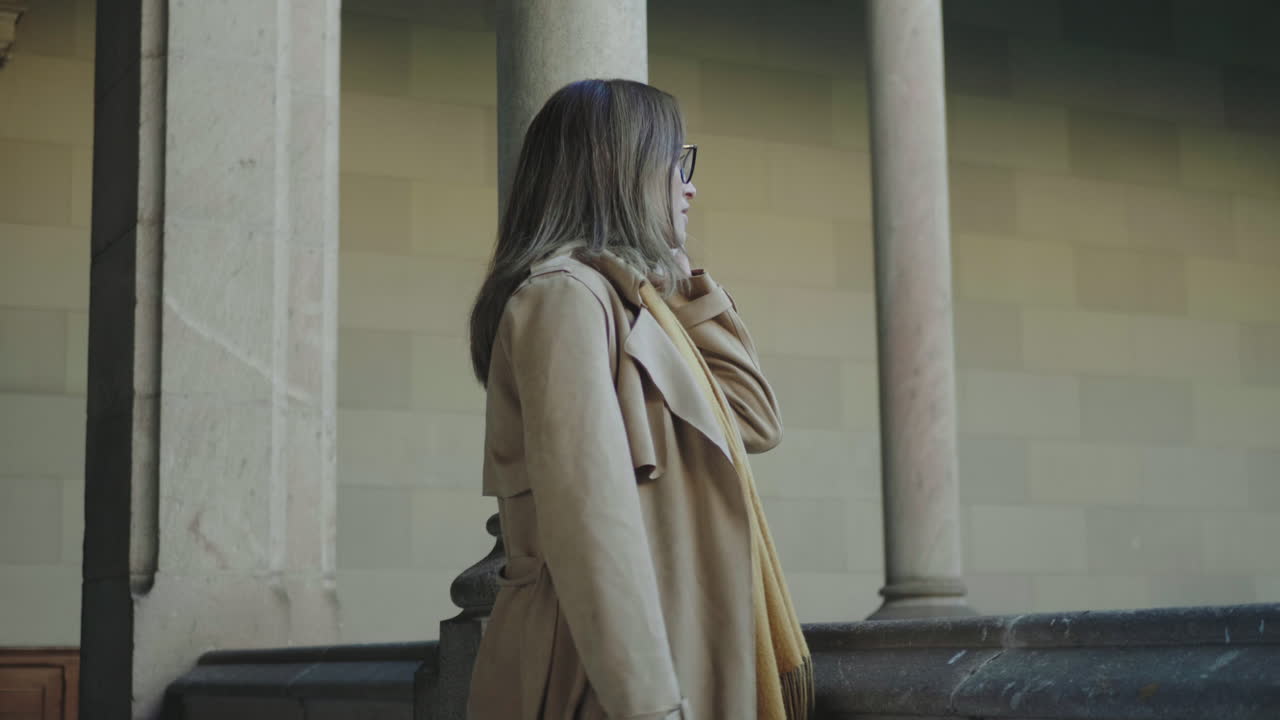 Student talking on smartphone at university
