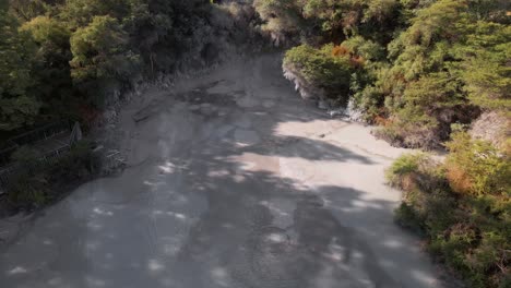 aerial shot above the mud pools in waiotapu, rotorua, new zealand