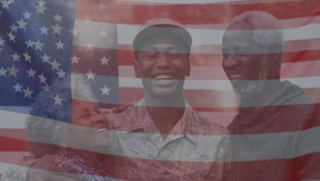 Animation-of-flag-of-america-waving-over-smiling-african-american-soldier-with-father-and-mother