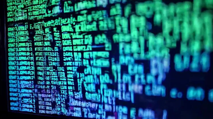 Computer Screen Displaying Scrolling Programming Code