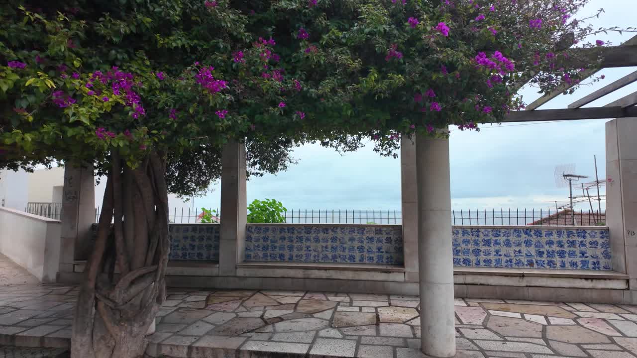 Stone architecture and mosaic tiles at Miradouro de Santa Luzia in Lisboa