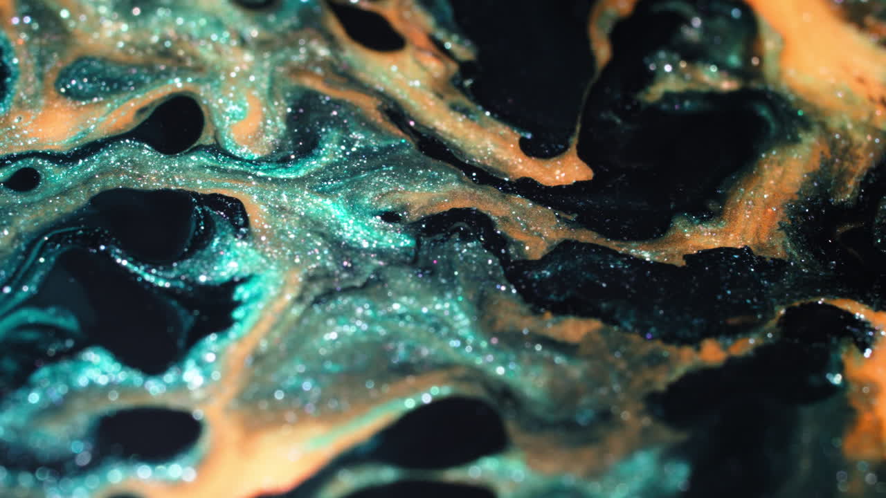 Vibrant macro of colorful substances blending, creating abstract patterns