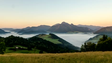 summer sunrise over mountains time lapse