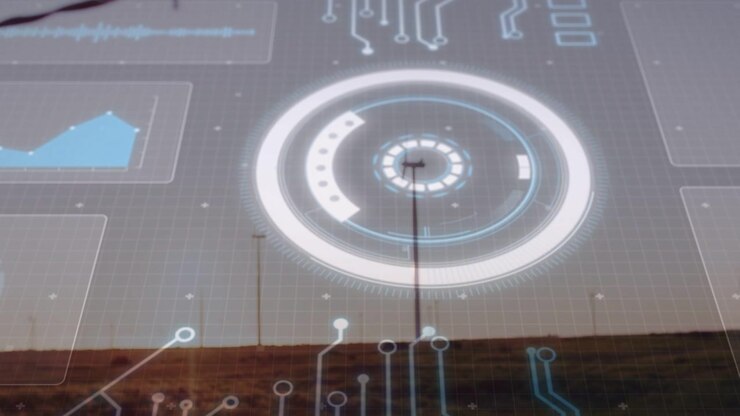 Projecting AR circular HUD rotating core over roadside embankment, with utility poles