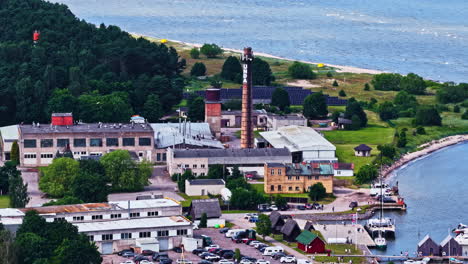 aerial view of industrial plant with chimney in engure parish, tukums municipality, latvia