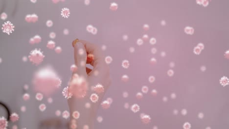 Animación-De-Células-Macro-Covid-19-Flotantes-Sobre-Una-Mujer-Caucásica-Tomando-Pastillas