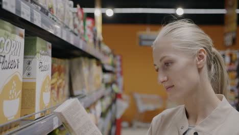 woman shopping for cereal in a grocery store