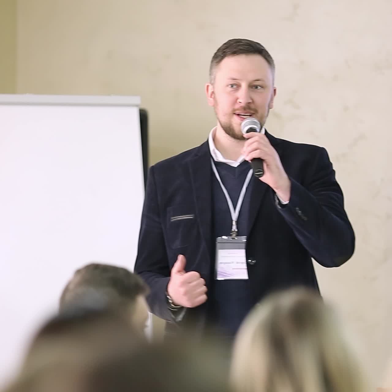 Audience Listening To Presentation At Conference