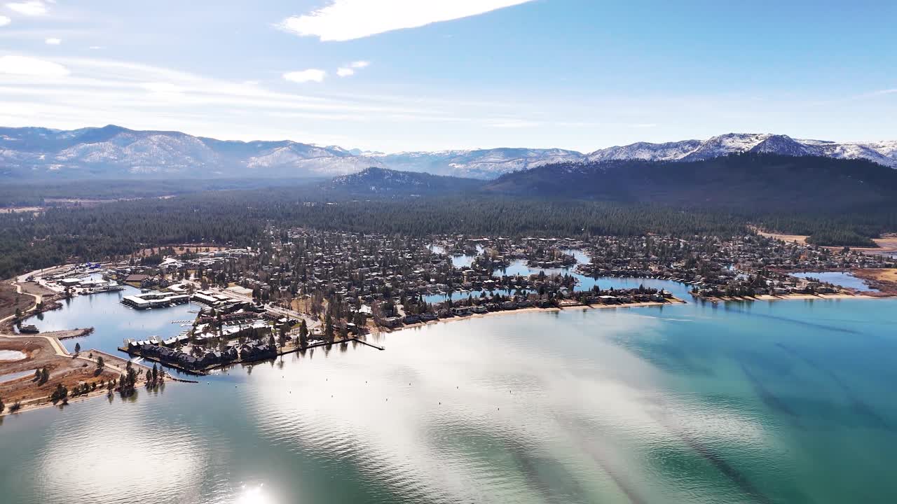 Aerial view of Lake Valley and Meyers with pine forest and highway leading to Lake Tahoe