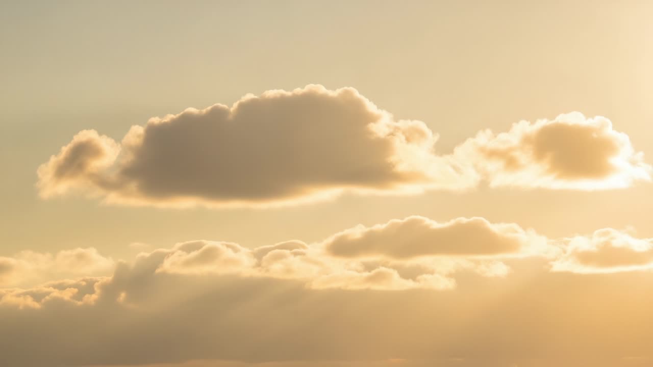 A Beautiful Transition of Clouds at Sunset, Capturing the Ethereal Essence of Nature's Evening Palette with Subtle Hues and Glowing Light