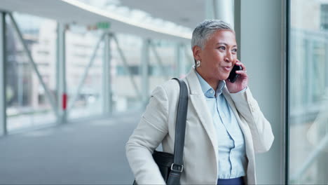 Travel,-airport-and-a-mature-woman-on-a-phone-call