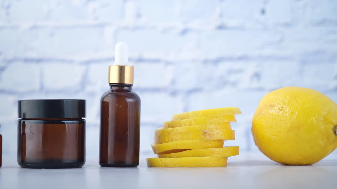 Lemon Skincare Products and Fresh Lemon Slices