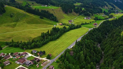 aerial of sorenberg village in the swiss alps in the mountains, remote swiss village landscape, europe