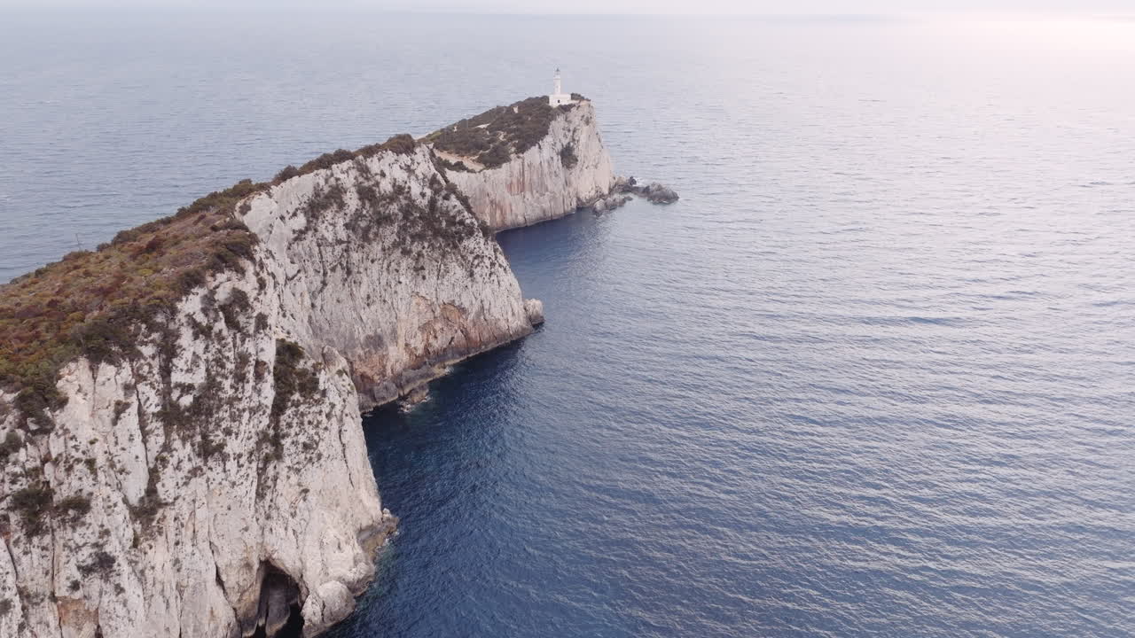 Aerial view of a lighthouse on a rocky cape