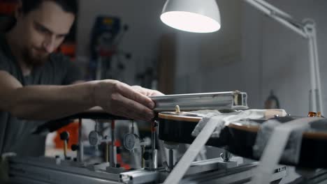 guitar repair process in a workshop
