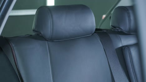 black leather seat covers in the car. beautiful leather car interior design. luxury leather seats in the car.