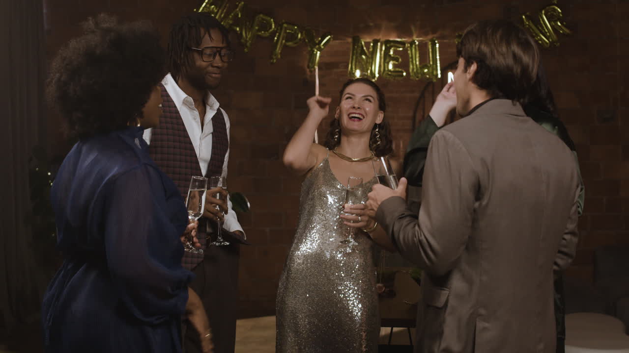 A group of friends celebrating New Year's Eve at a party