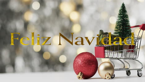 feliz navidad texto en oro sobre árbol de navidad en el carrito de compras y bolas en luces bokeh