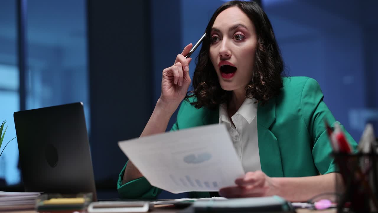 Businesswoman analyzing data in the office