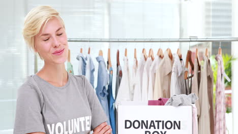 pretty volunteers looking at camera with arms crossed