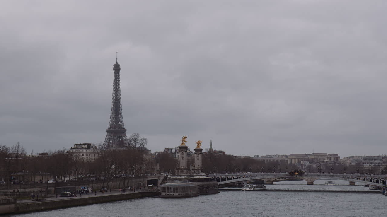Well-known Eiffel Tower With Pont Alexandre III Spanning The Seine River In Paris, France