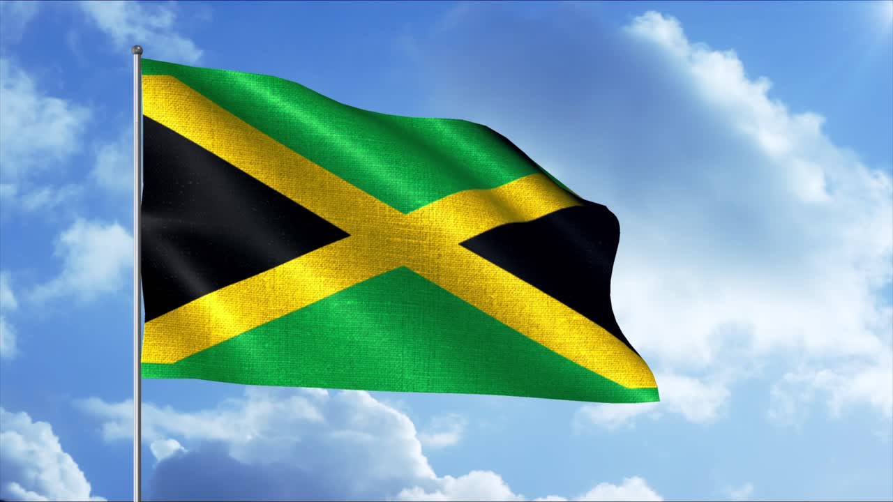la bandera de jamaica ondeando en el viento