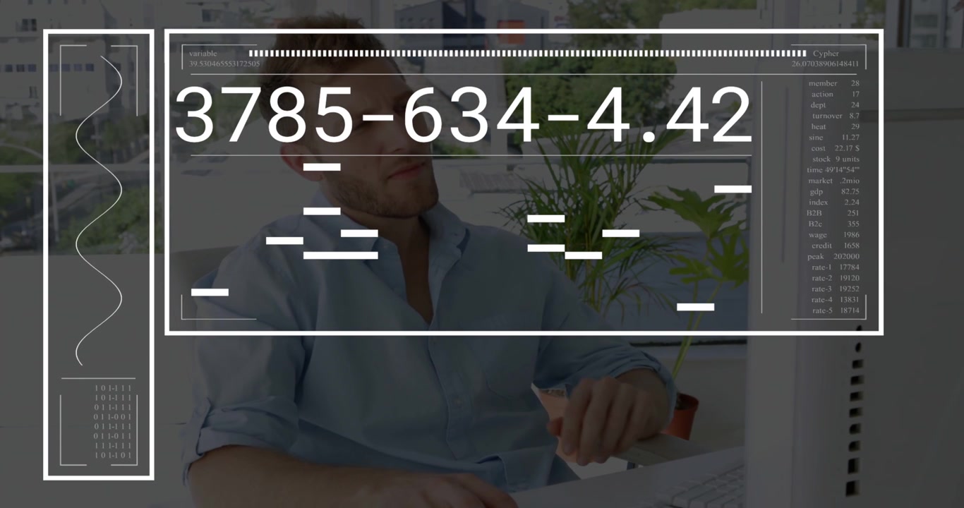Vertical video: Typing man in blue shirt reading HUD codes with overlay appearing, writing on pad