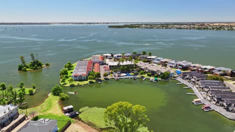 over the inlet behind the resort houses and apartments on the shore of lake mulwala, nsw, australia