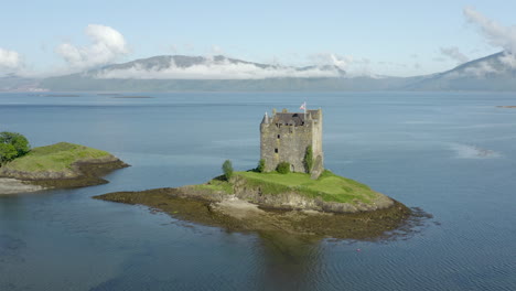 An-aerial-view-of-Castle-Stalker-on-Loch-Laich-on-a-sunny-morning