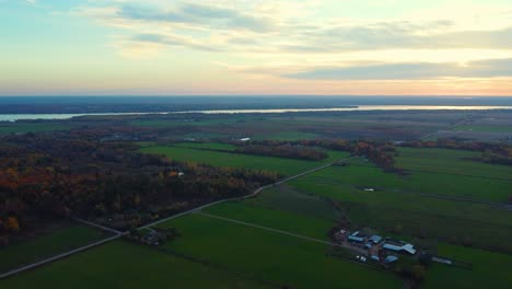 aerial footage of rural gatineau quebec in autumn at sunset